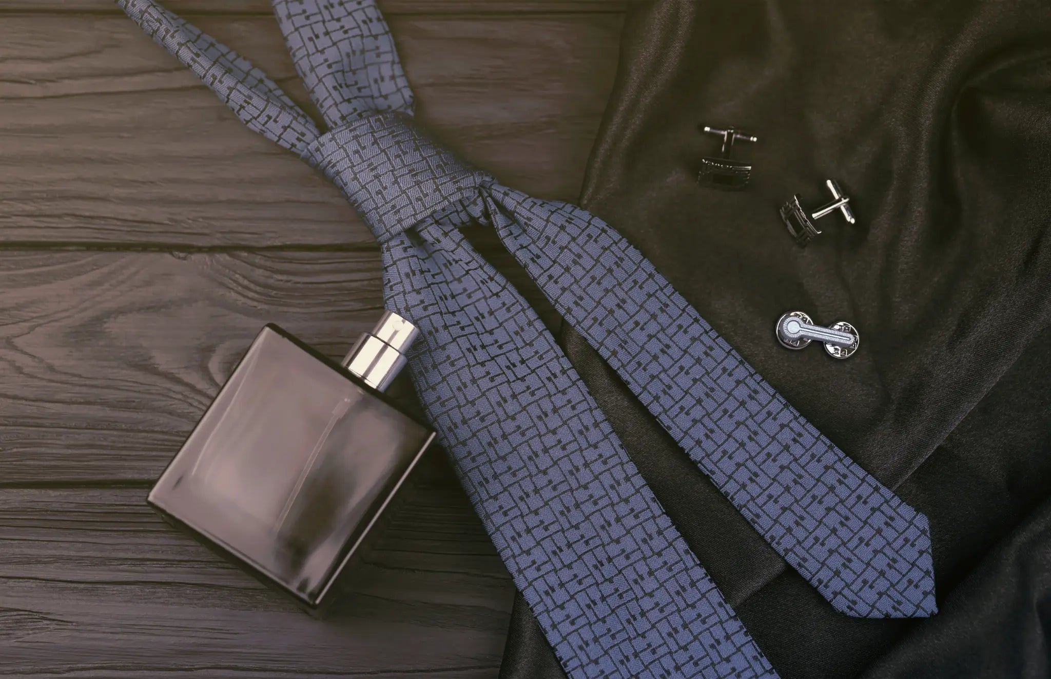 Man in blazer with lapel pin